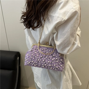 Vintage lavender evening clutch with 3D floral textures, pearls, and a gold chain strap