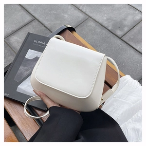 Minimalist creamy white shoulder bag with smooth PU leather finish and stitching details