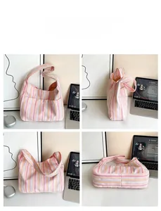 Vues détaillées du grand sac fourre-tout en nylon rayé avec poches extérieures pratiques