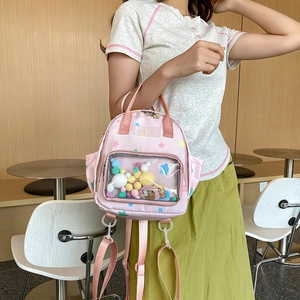 Rosa Rucksack mit Sternmuster und transparentem Fenster für bunte Plüschtiere