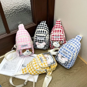 Kids plaid crossbody sling bags in five colors with cute plush toys in clear pockets