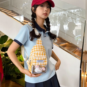 Yellow plaid crossbody chest bag with cute bunny doll in clear PVC window display