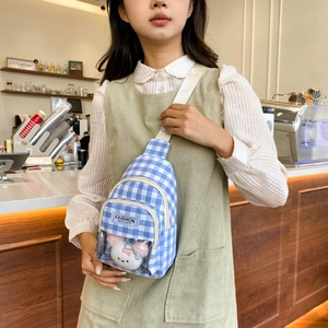 Blue and white checkered crossbody chest bag with cute plush bunny in clear window