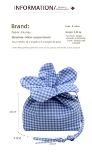 Detailed size chart and view of a blue plaid canvas drawstring bucket bag with floral motif