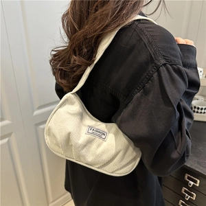 Minimalist beige corduroy underarm bag with Fashion Instinct label for women