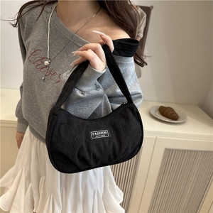 Fashionable black corduroy underarm bag with pleated design and crescent shape style