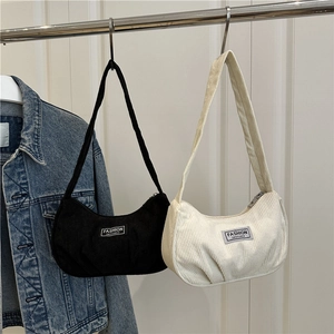Corduroy underarm bags in black and beige colors with a vintage ruched crescent design