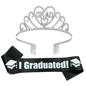 Detail of silver rhinestone GRAD tiara and black I Graduated satin sash set for parties