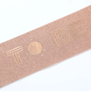 Rose gold glitter Bride to Be sash featuring sun and moon patterns for bachelorette party