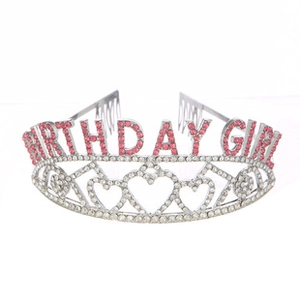 Detail of silver birthday girl crown headband with pink rhinestones and hair combs
