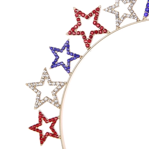Detail of gold headband with red, blue and white rhinestone stars in US flag colors