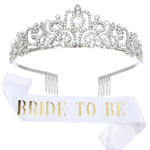 Close-up of rhinestone tiara with combs and a satin Bride To Be sash set for bridal party