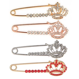 Detail view of 4-piece crown safety pin set with multicolored rhinestones and zinc alloy