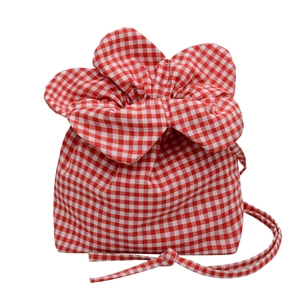Minimalist red and white gingham drawstring bucket bag with floral petal opening