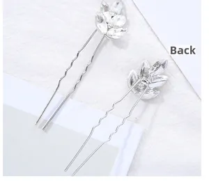 Détail d'une épingle à cheveux feuilles argentées montrant la vue de face et de l'arrière