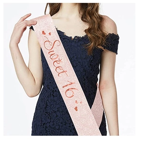Close-up of rose gold Sweet 16 sash with glitter texture and metallic font for birthdays