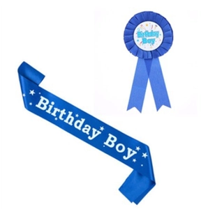 Blue Birthday Boy party kit featuring a satin sash and matching pleated ribbon badge