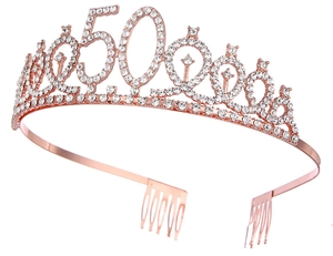 Close-up of sparkling rhinestone number 50 crown on rose gold metal headband for party