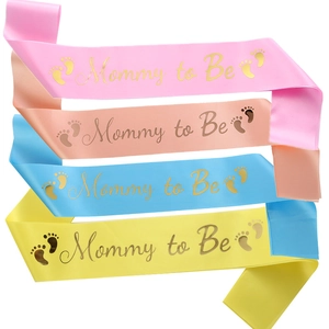Set of four satin Mommy to Be sashes in pastel colors with gold foil text and footprints
