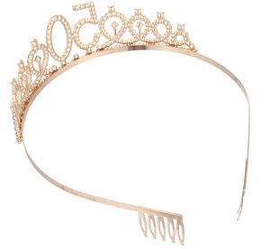 Detailed close-up of golden number 50 birthday tiara with rhinestones and hair comb pins
