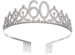 Macro view of silver 60th birthday tiara with sparkling rhinestones and metal combs