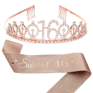 Detail of Sweet 16 rose gold rhinestone crown and glitter sash with safety pin