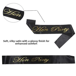 Detailed macro view of black satin Hen Party sash with elegant gold foil lettering