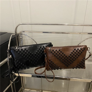 Fashionable large envelope clutch bags in black and brown with studded V-shaped pattern
