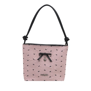 Pink fashion bucket bag with black bow print and heart pendant on white background