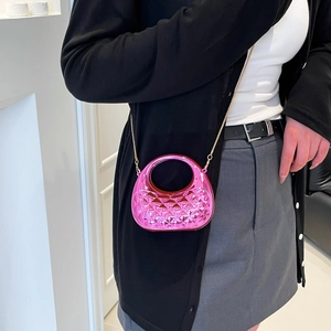 Metallic magenta crescent handbag with quilted texture and gold chain shoulder strap