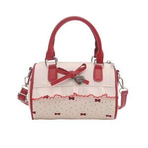 Rote und weiße gepunktete Zylindertasche mit Spitze und elegantem Schleifendesign