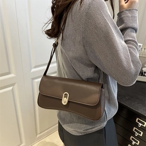 French retro chocolate brown leather shoulder bag with elegant gold metal twist lock