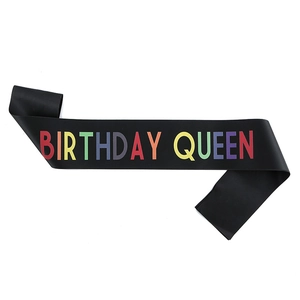 Elegant black satin Birthday Queen sash with vibrant rainbow colored lettering