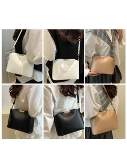 Collage de sacs bandoulière minimalistes en blanc, noir, beige avec boucles dorées