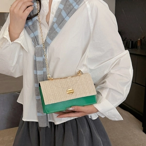 Chic woven patchwork crossbody bag with green leather base and gold chain strap