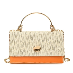Fashionable woven straw and orange leather crossbody bag with gold chain and metal handle