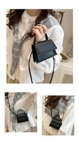 Multiple views of a black minimalist leather crossbody bag with a sleek top handle