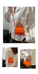 Three lifestyle views of a bright orange mini square bag with crossbody strap and top handle