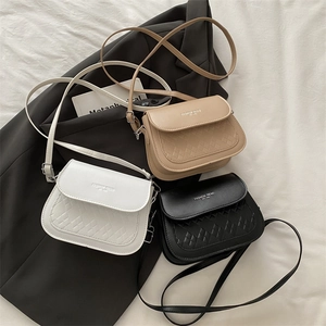 Three stylish quilted small square shoulder bags in beige, white, and black with logo details