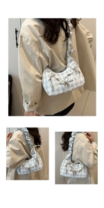 Multiple views of a blue checkered cloud bag with bows and ruched straps on a model