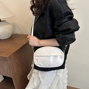 White PU leather crossbody bag for women with elegant gold hardware for casual style