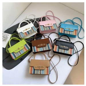 Fashionable woven straw contrast crossbody bags with metallic swivel lock and shoulder strap