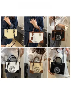 Tote bags in six colors with contrast trim and letter logo, shown with a fashion model