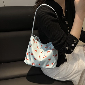 Light blue cherry print shoulder bag for women with a minimalist aesthetic for summer style