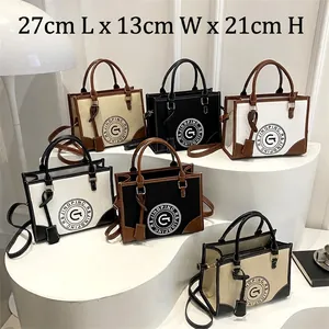 Large capacity canvas tote bag with letter print and leather trim in six colorways