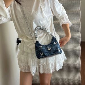 Deep blue denim Y2K shoulder bag with silver butterfly charms and chain strap
