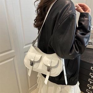 Glossy white leather shoulder bag with utility pockets and silver buckles