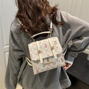 Chic floral printed mini backpack with cherry patterns and adjustable straps for women