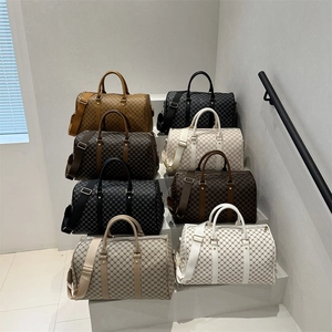 Large travel duffel bag with geometric pattern and adjustable shoulder straps