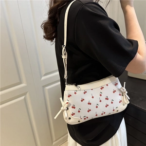 Trendy white cherry print underarm bag with ribbon detail and adjustable shoulder strap